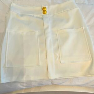 This is a stretch mini skirt made of a thick cozy feeling fabric. Side zipper.